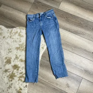 Free people raw hem straight leg jeans