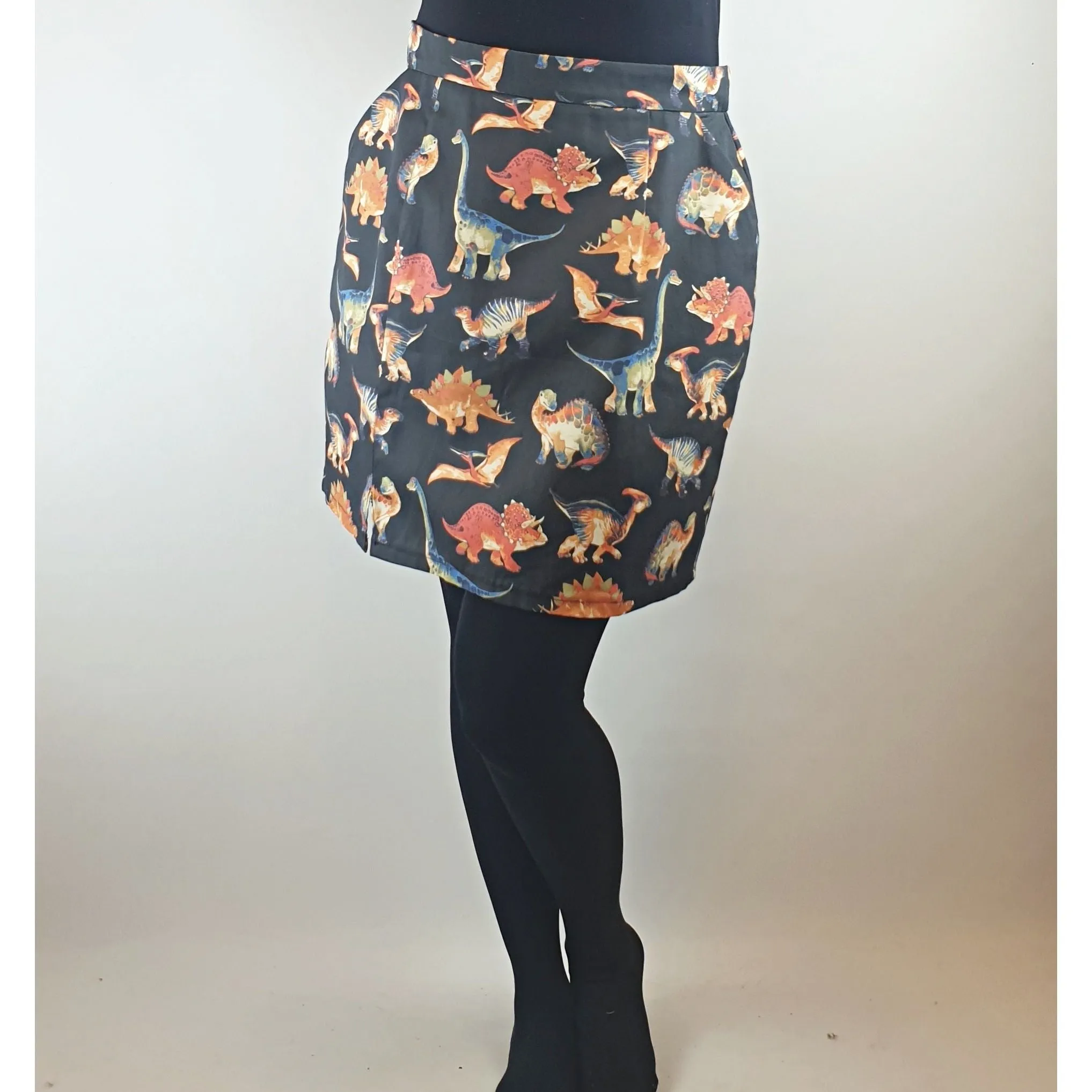 Handmade black skirt with adorable dinosaur print best fits size 10