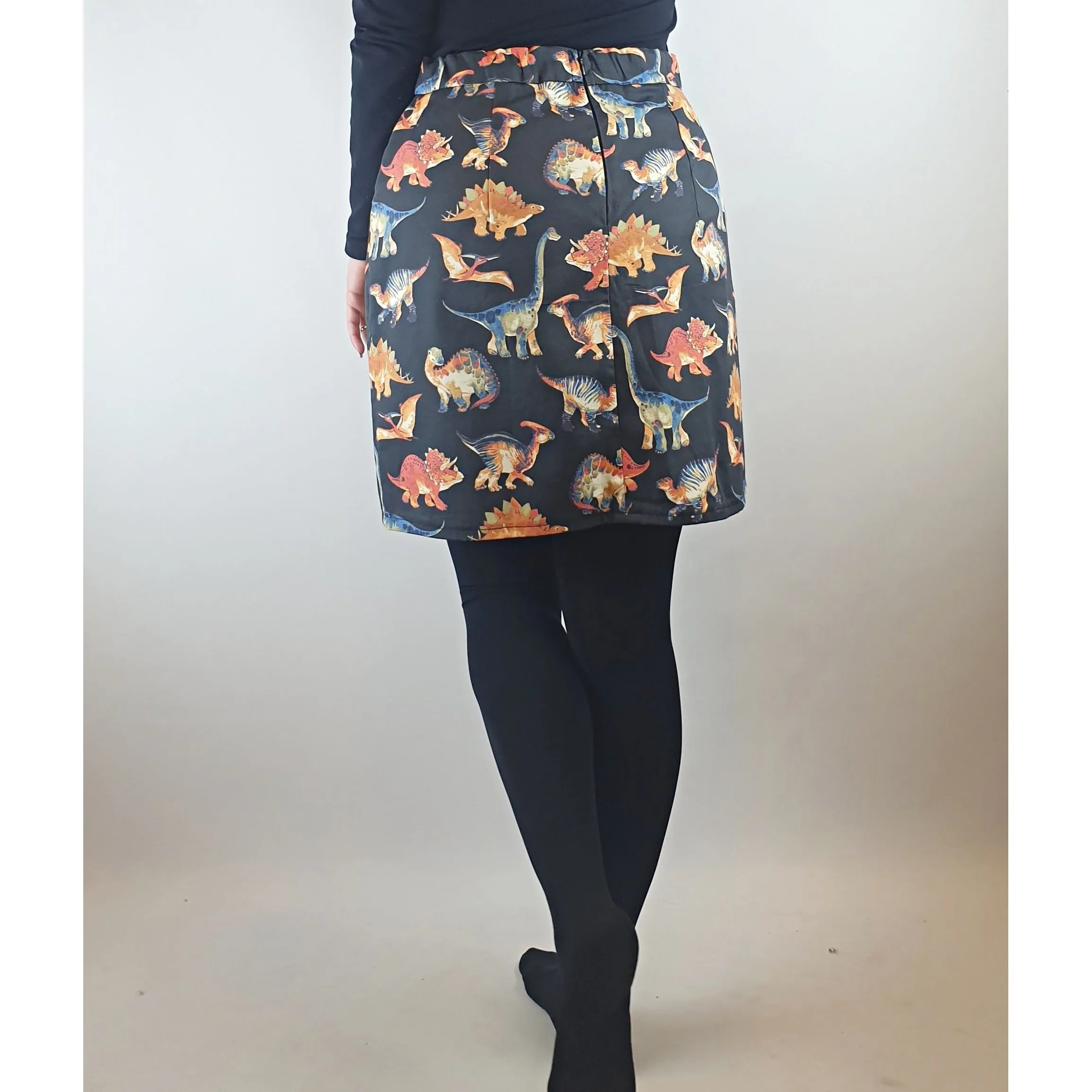 Handmade black skirt with adorable dinosaur print best fits size 10